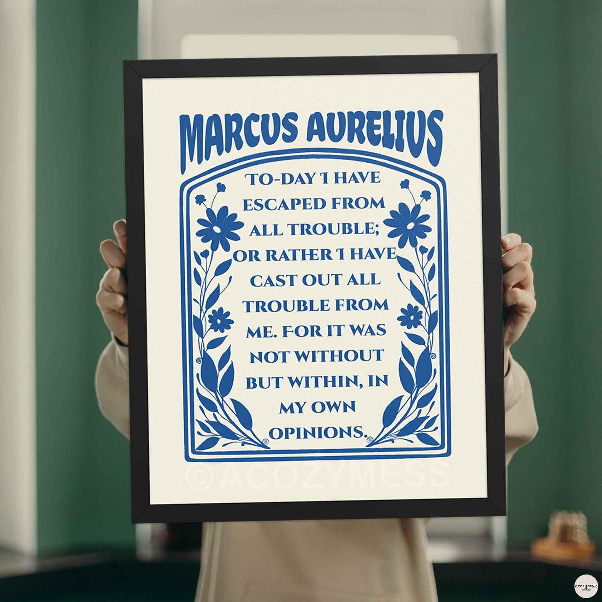 Marcus Aurelius Poster dark blue on cream with floral design, in black frame stoicism wall art.
