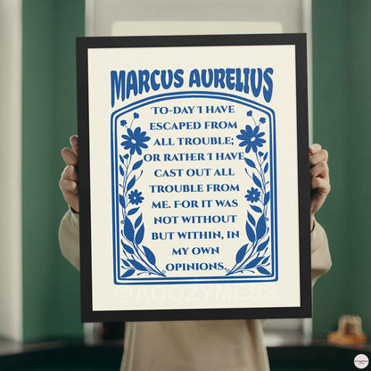 Marcus Aurelius Poster dark blue on cream with floral design, in black frame stoicism wall art.