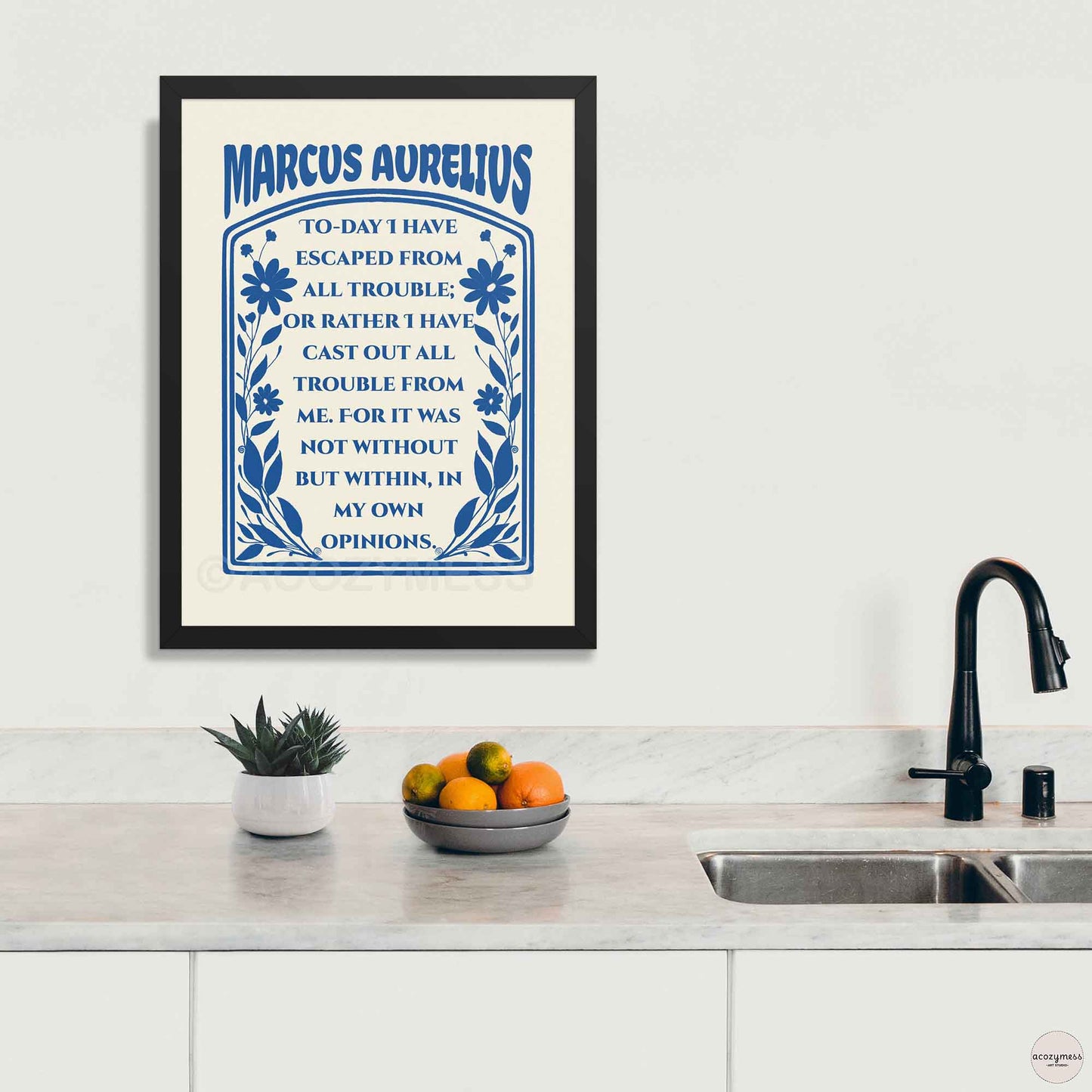 Marcus Aurelius print dark blue on cream with floral design, in black frame.