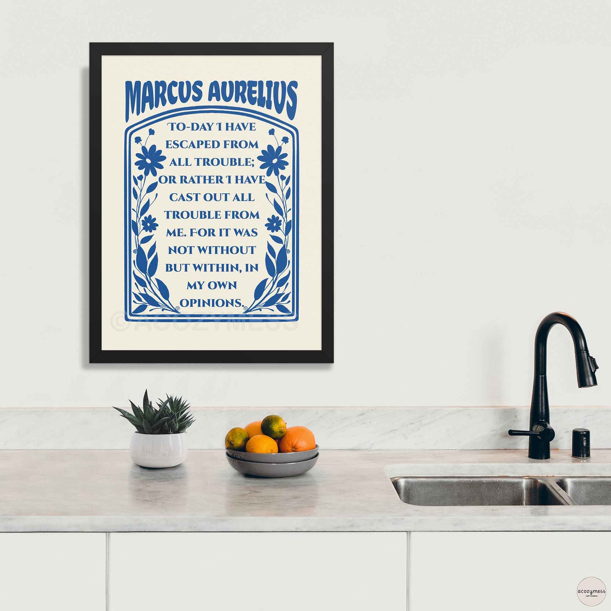 Marcus Aurelius print dark blue on cream with floral design, in black frame.