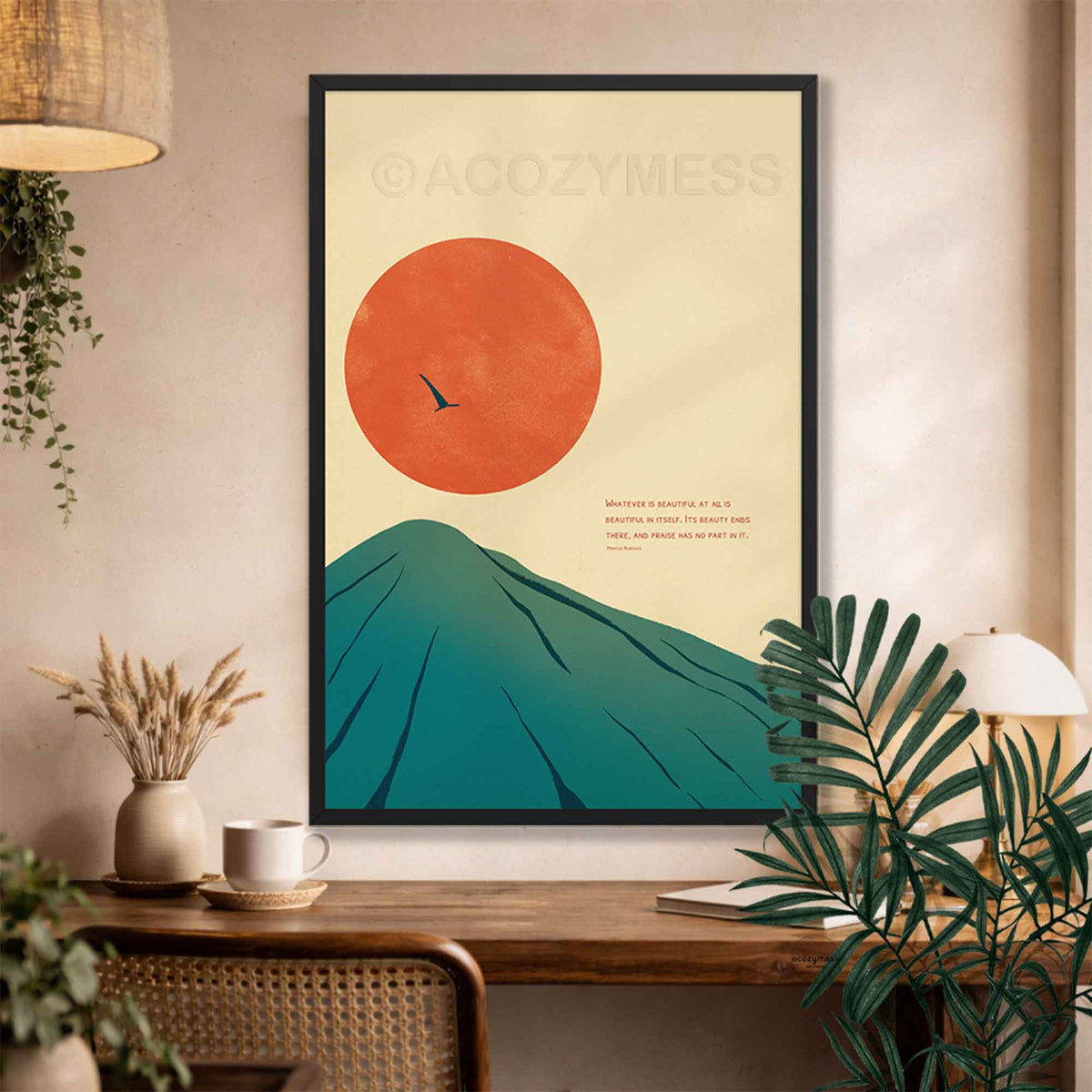 Marcus Aurelius On Beauty & Praise Stoic Art Poster in black frame displayed on a wall above a desk.