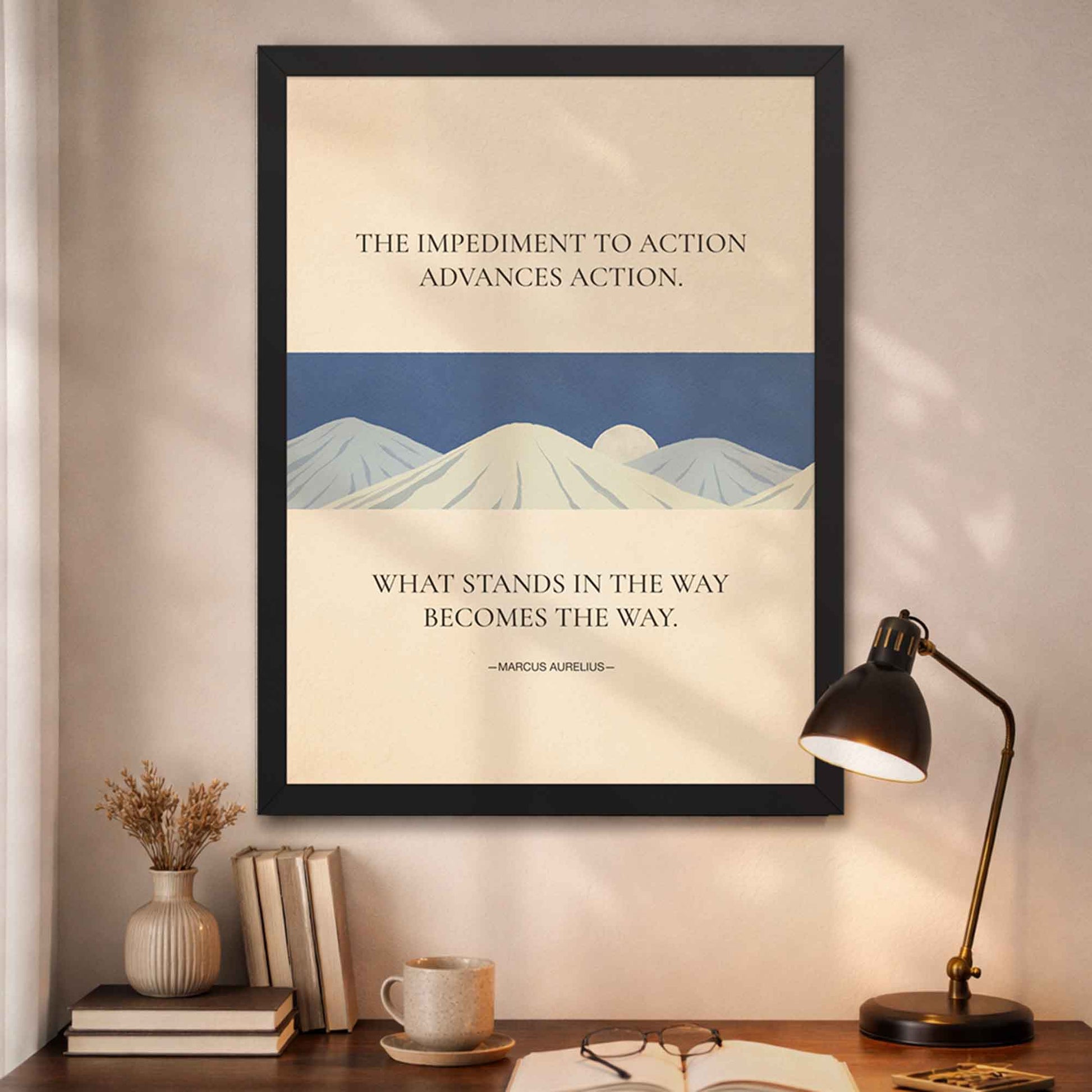 Marcus Aurelius quote poster in black frame with beige background and blue mountains