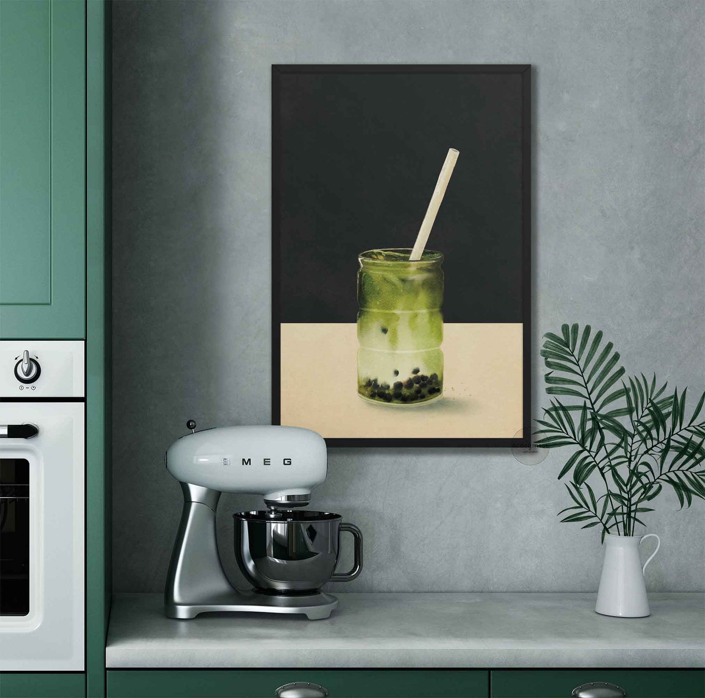 Kitchen counter artwork of a green matcha  tea  drink in black frame.