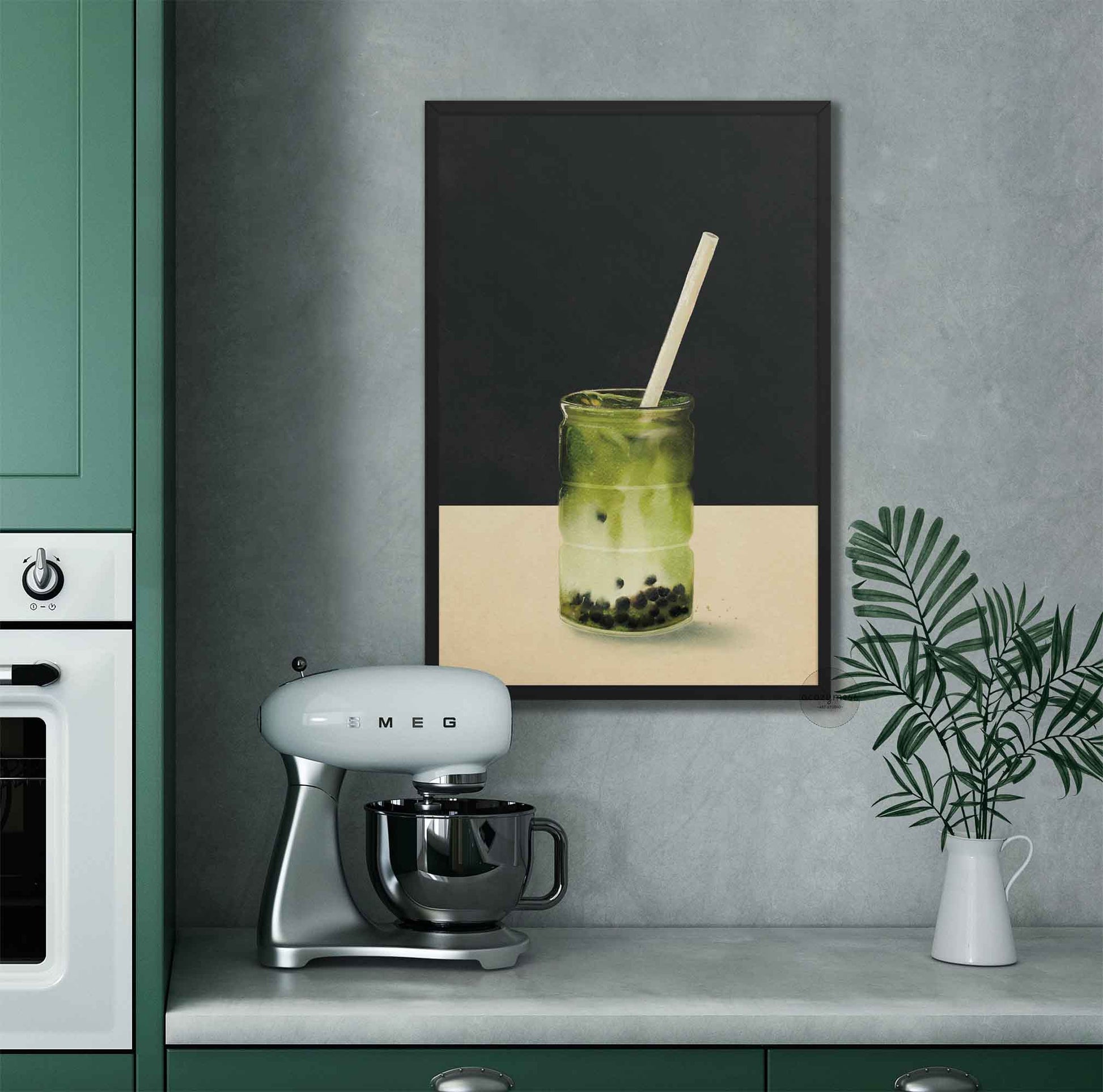Kitchen counter artwork of a green matcha  tea  drink in black frame.