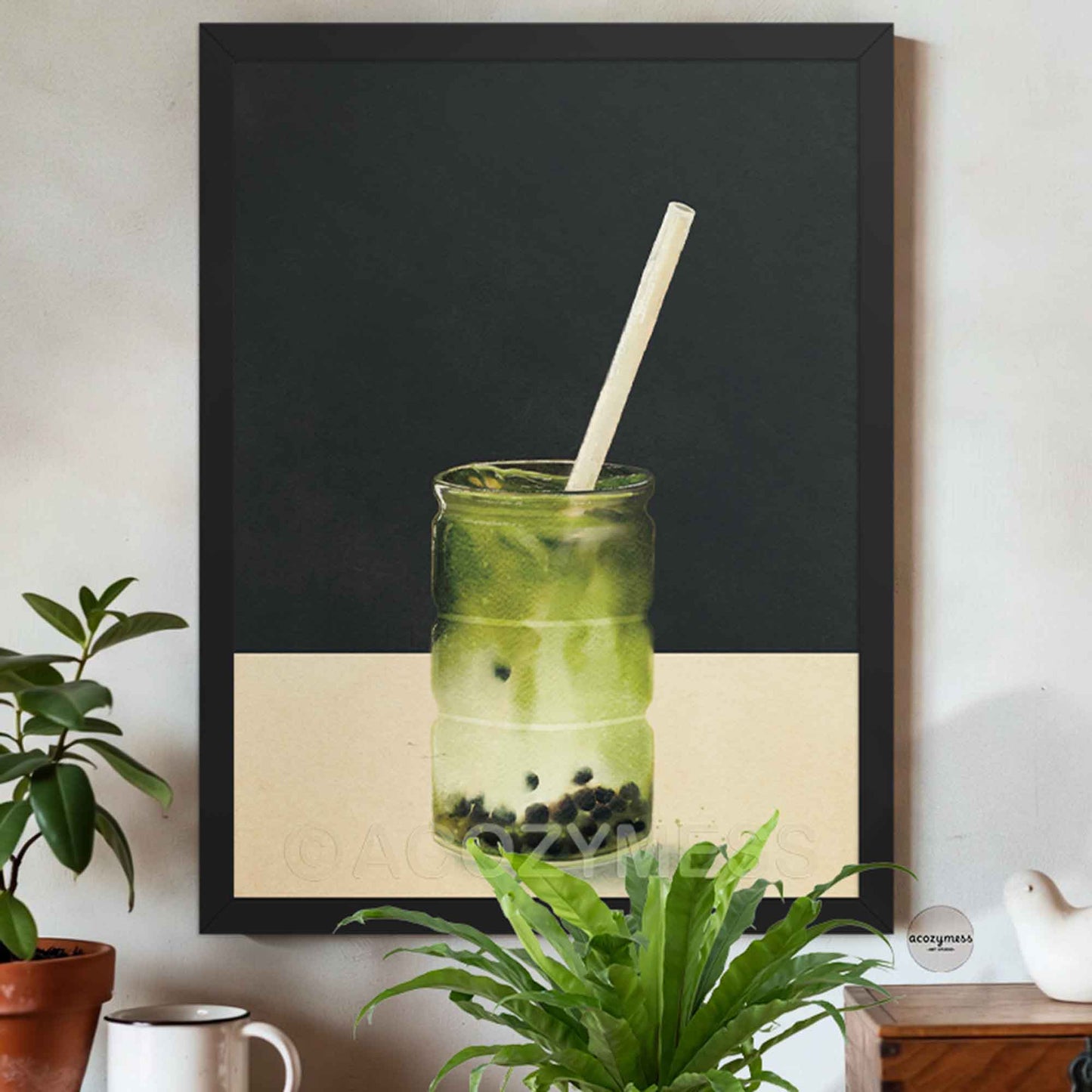 Black-framed matcha latte wall art featuring a glass of matcha with boba on a dark gray and beige background.