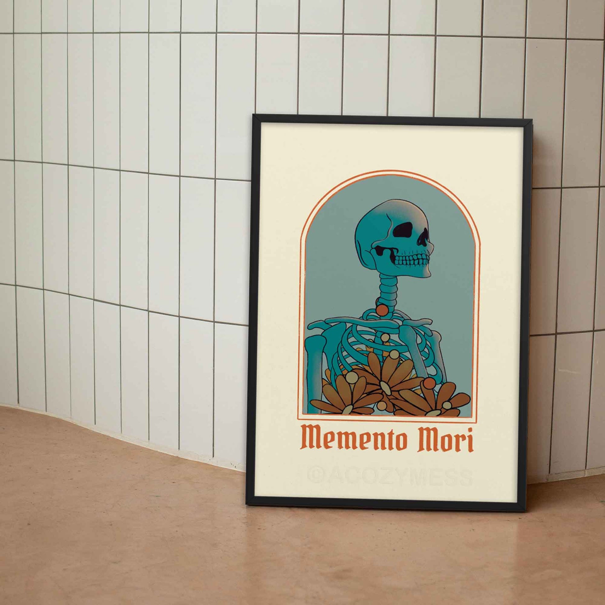 Memento Mori poster featuring a striking skeleton illustration inviting reflection on mortality and the transient nature of life in blue, beige & orange hues. The print is framed in black frame.