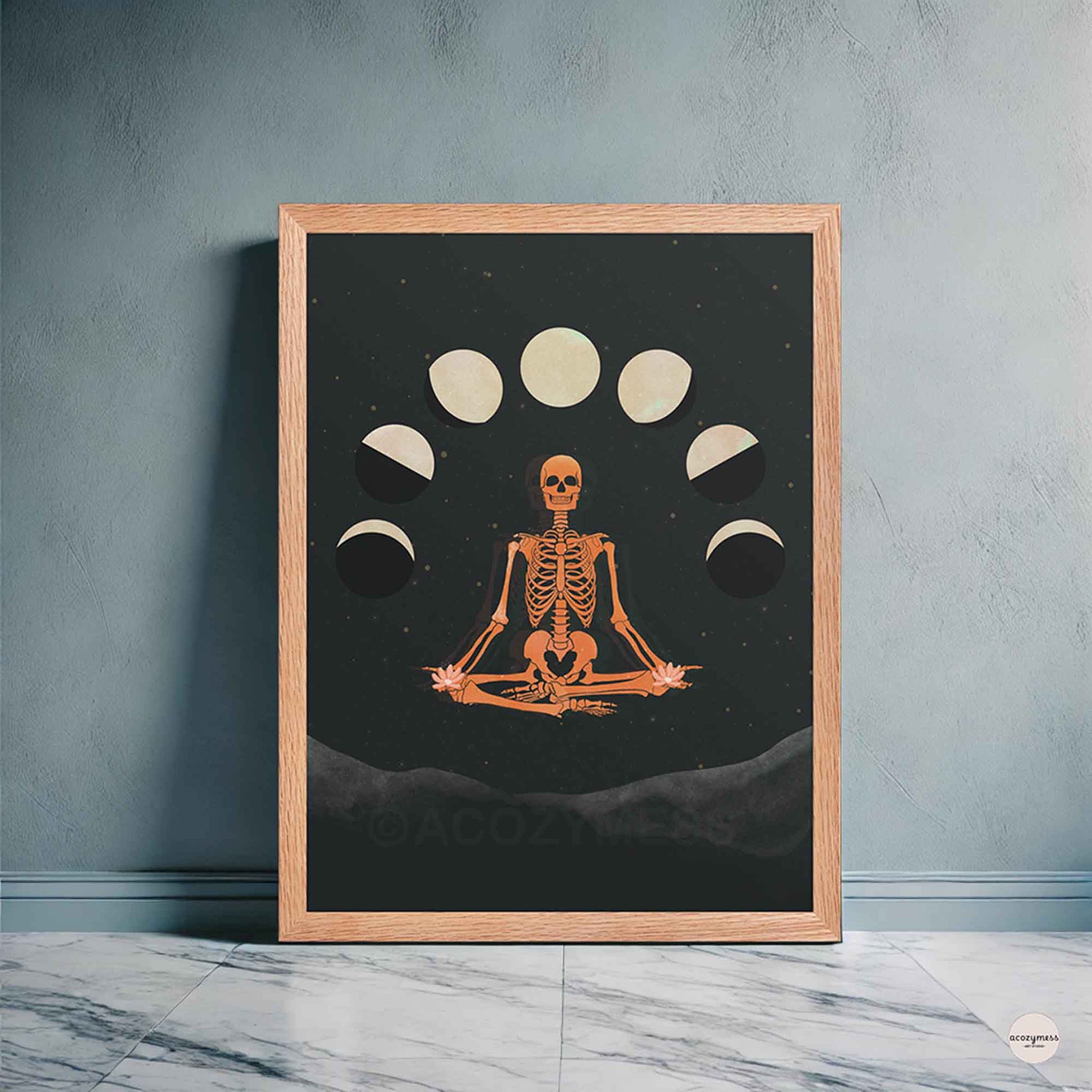 Meditating skeleton and moon phase artwork framed in oakwood for meditation or yoga room.