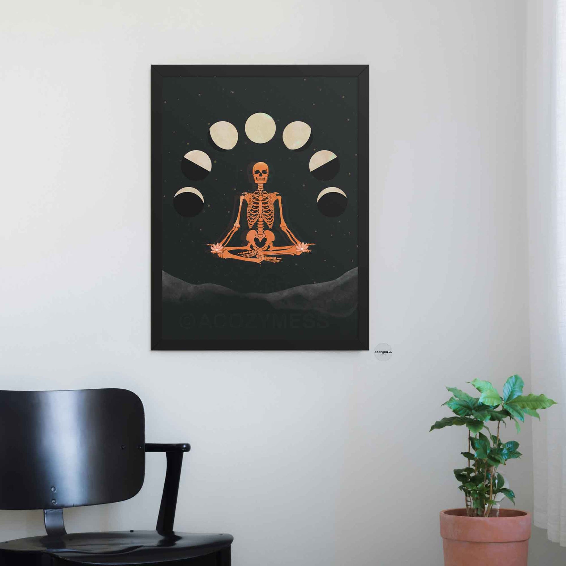 Spiritual skeleton wall art with moon cycles in black frame, for mindful and interesting wall decor