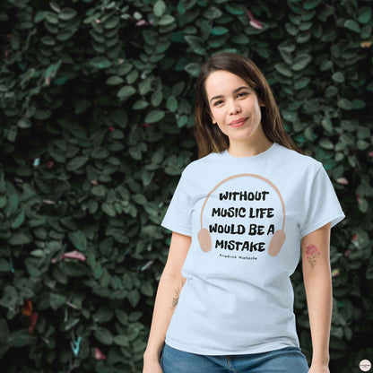 A woman wearing light blue t-shirt featuring the quote "Without music, life would be a mistake" by Friedrich Nietzsche in a playful, eye-catching font. 