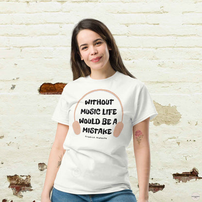A woman wearing white t-shirt featuring the quote "Without music, life would be a mistake" by Friedrich Nietzsche in a playful, eye-catching font. 