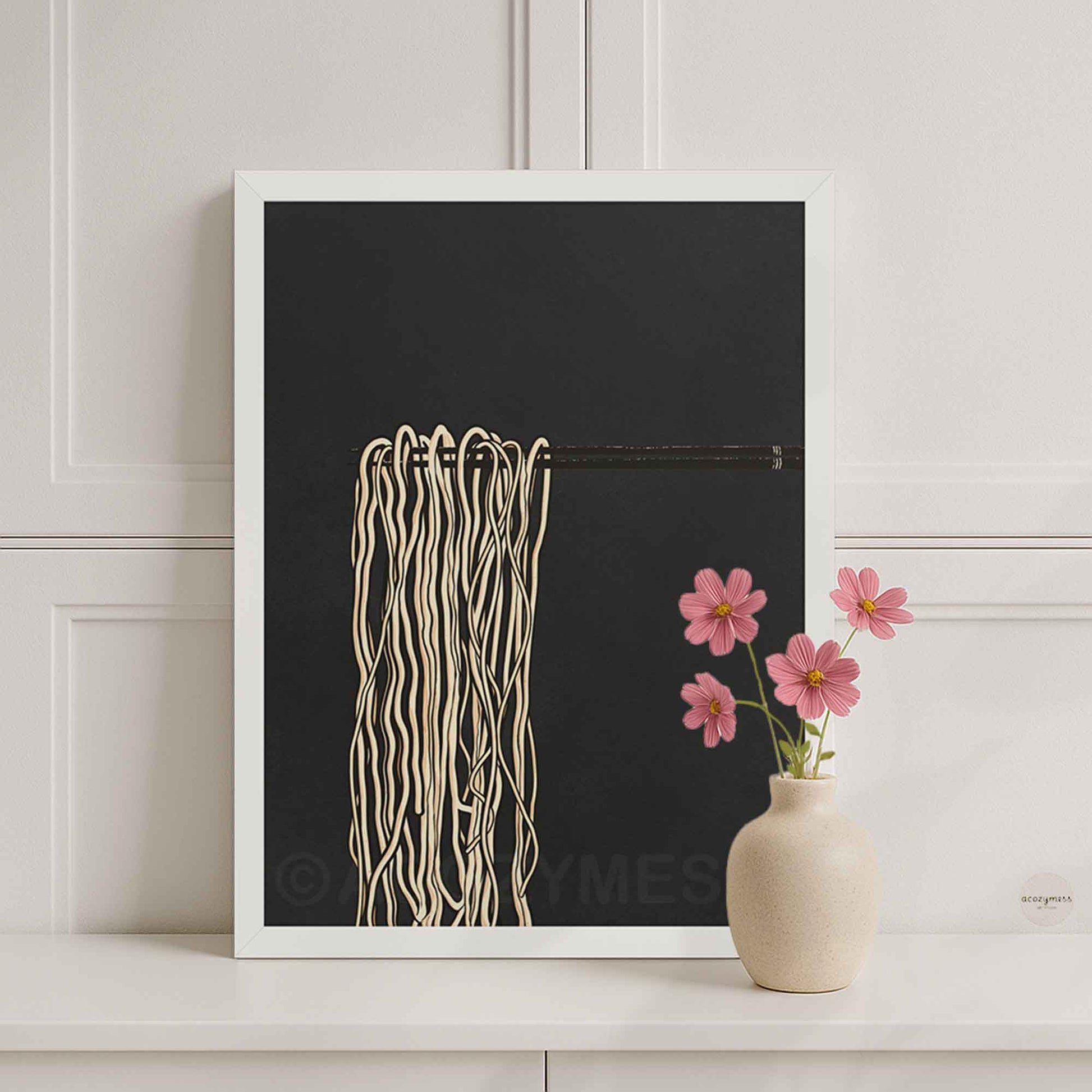 White-framed ramen wall art showing chopsticks lifting noodles, minimalist illustration in black, gray, and beige.