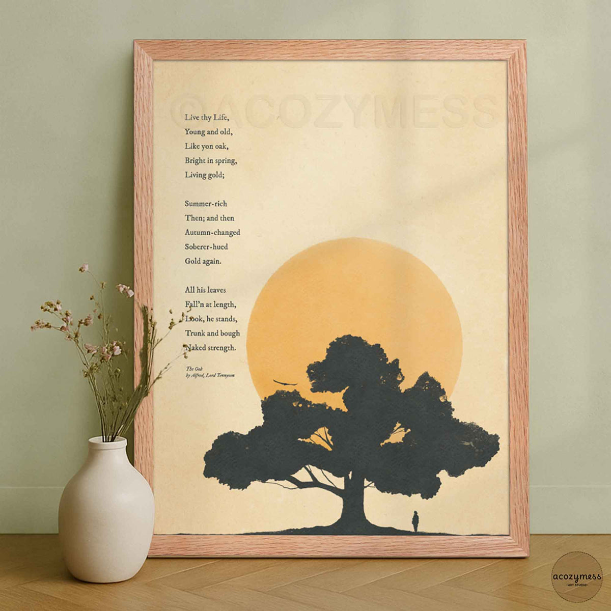The Oak poetry poster by Alfred Lord Tennyson in an oakwood color frame made of ayous wood, showcasing a dark silhouette of an oak tree against an amber sun and warm textured background.
