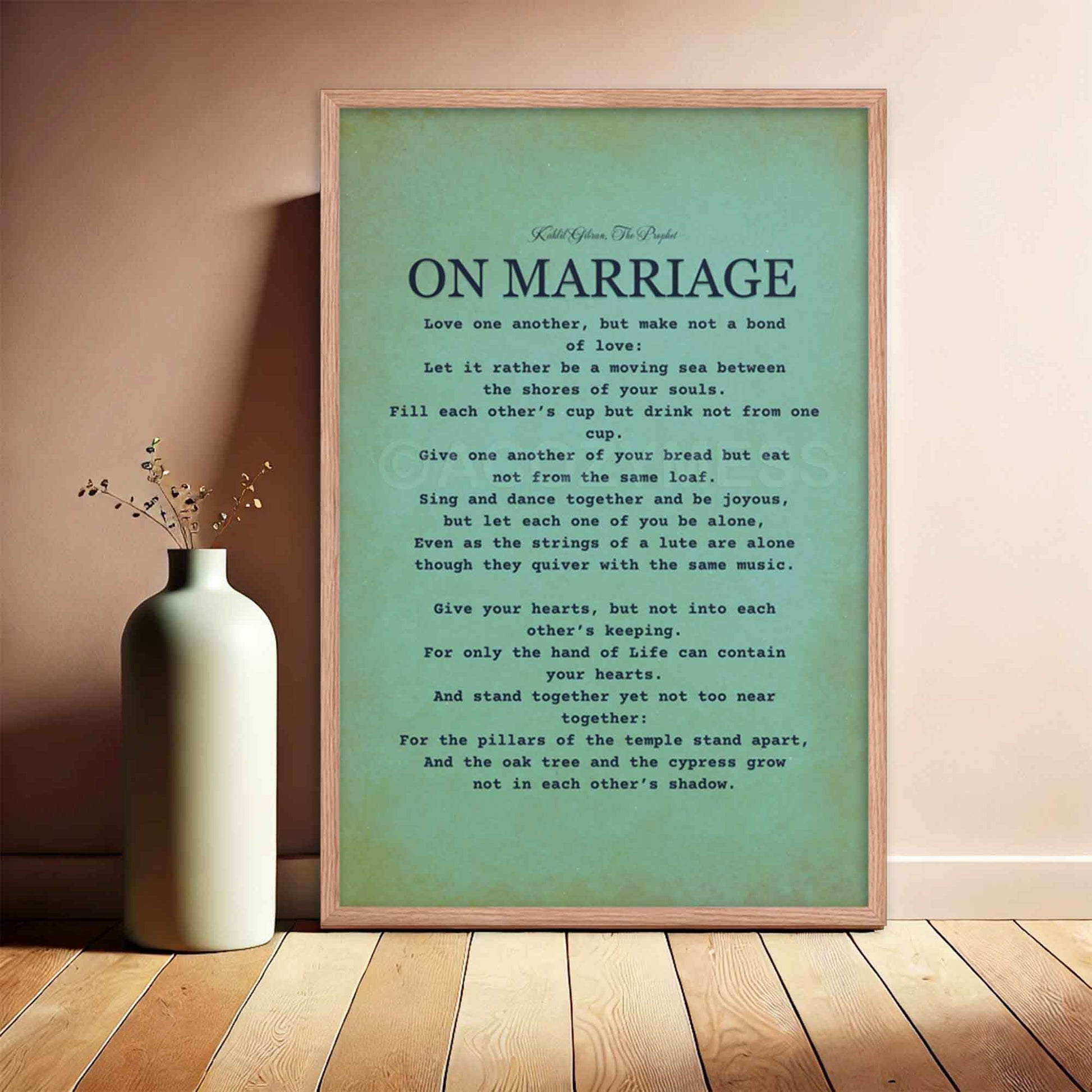 Kahlil Gibran Poster On Marriage, black on textured  bluish green background, displayed in red oak frame.