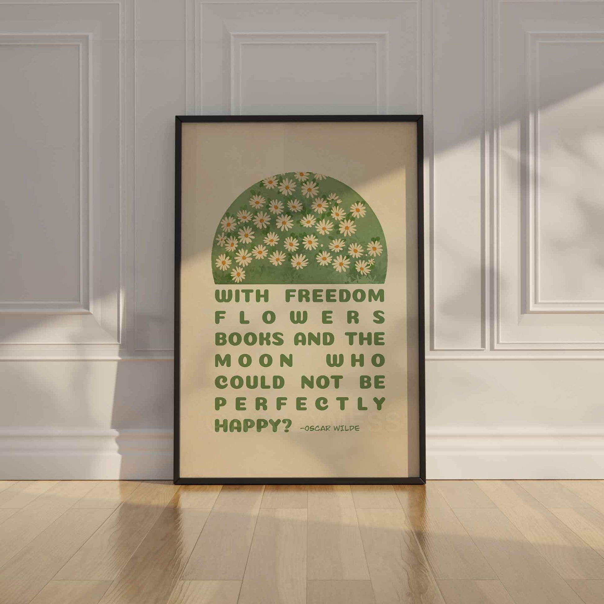 Poster featuring Oscar Wilde's quote, With freedom, flowers, books, and the moon, who could not be perfectly happy? with a delicate design of white flowers on green and beige, displayed in black frame.