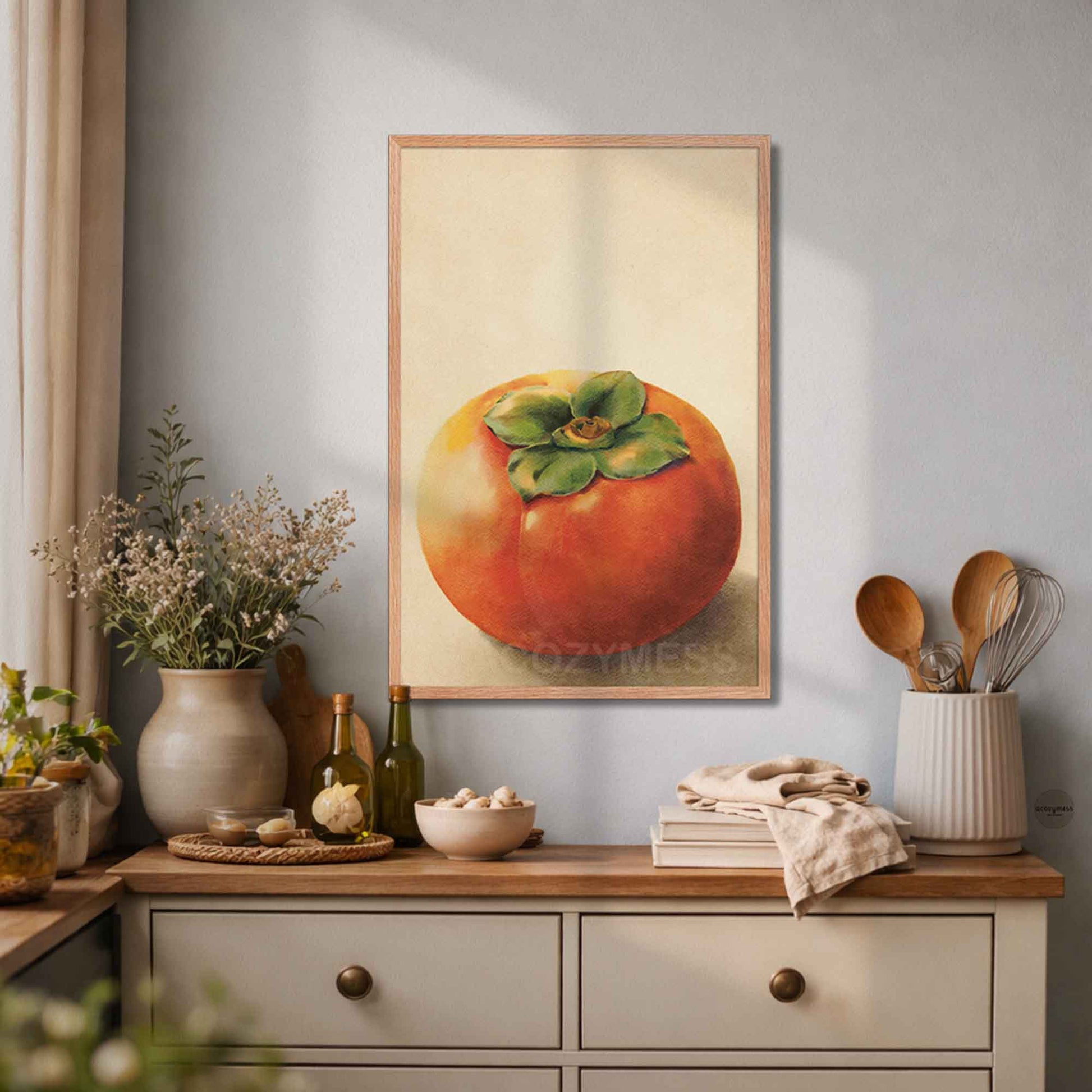 oakwood Framed artwork of a persimmon on a wall above a wooden dresser.