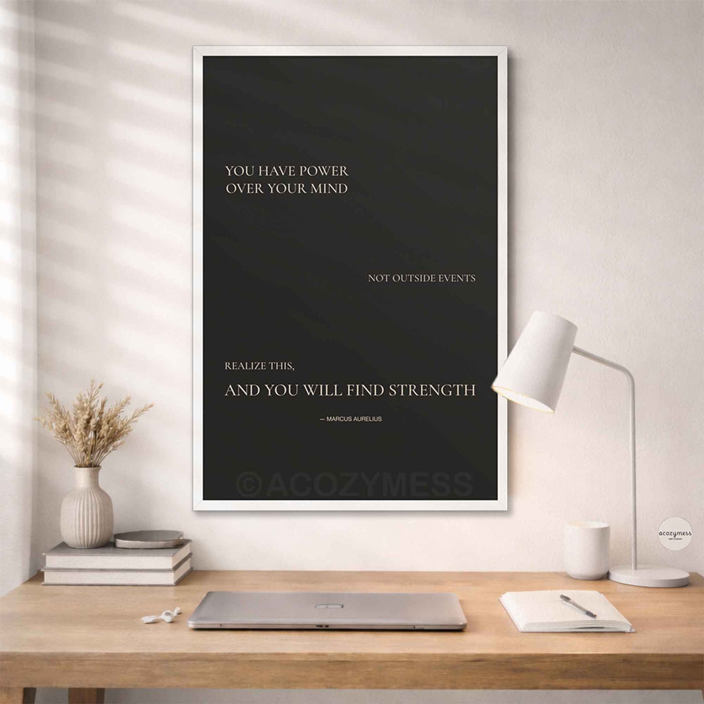 White Framed motivational poster Minimalist design with Marcus  Aurelius quote on dark background.
