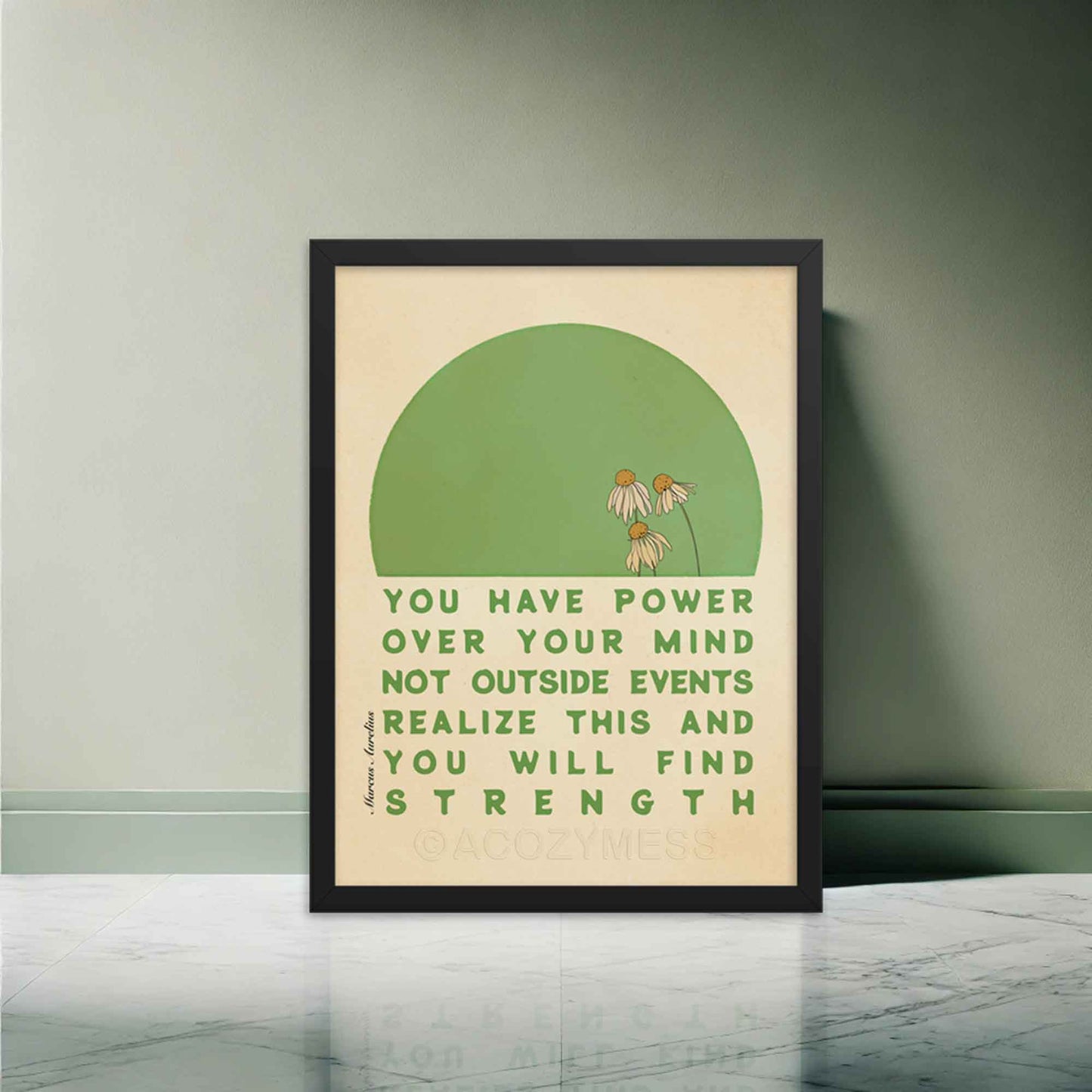 Stoic wall art featuring Marcus Aurelius quote, You have power over your mind not outside events. Realize this, and you will find strength, with a green and beige floral design, displayed in a black frame.