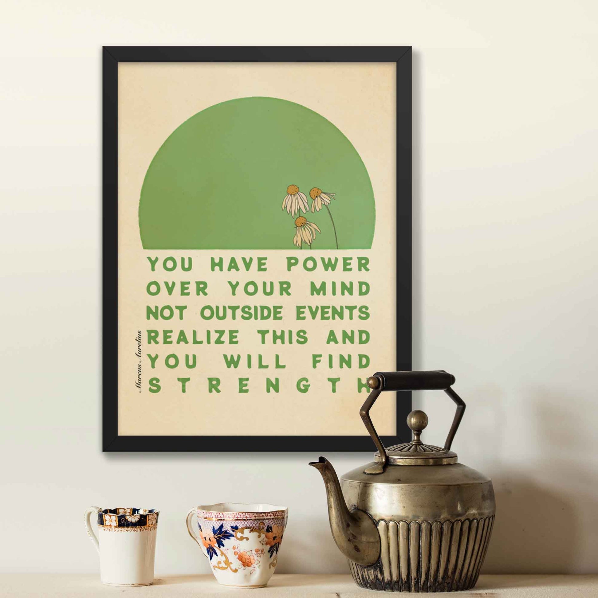 Stoic poster featuring Marcus Aurelius quote, You have power over your mind not outside events. Realize this, and you will find strength, with a green and beige floral design, displayed in a black frame.