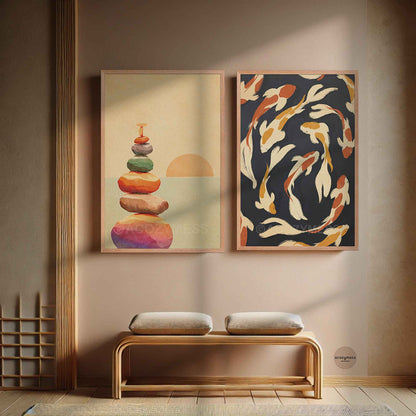 Two framed wall art prints displayed side by side above a wooden bench in a styled interior. The left print shows stacked stones with a soft sun, and the right print shows abstract koi fish on a dark background.