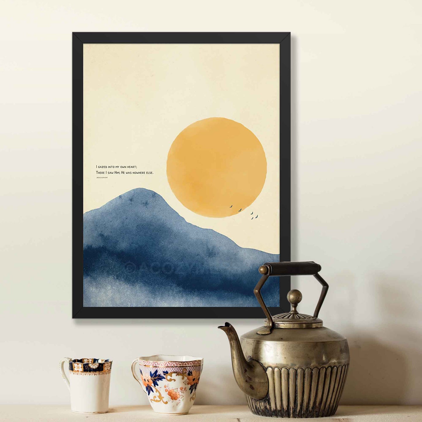 Rumi quote poster with sun and mountain art, displayed in black frame as spiritual decor