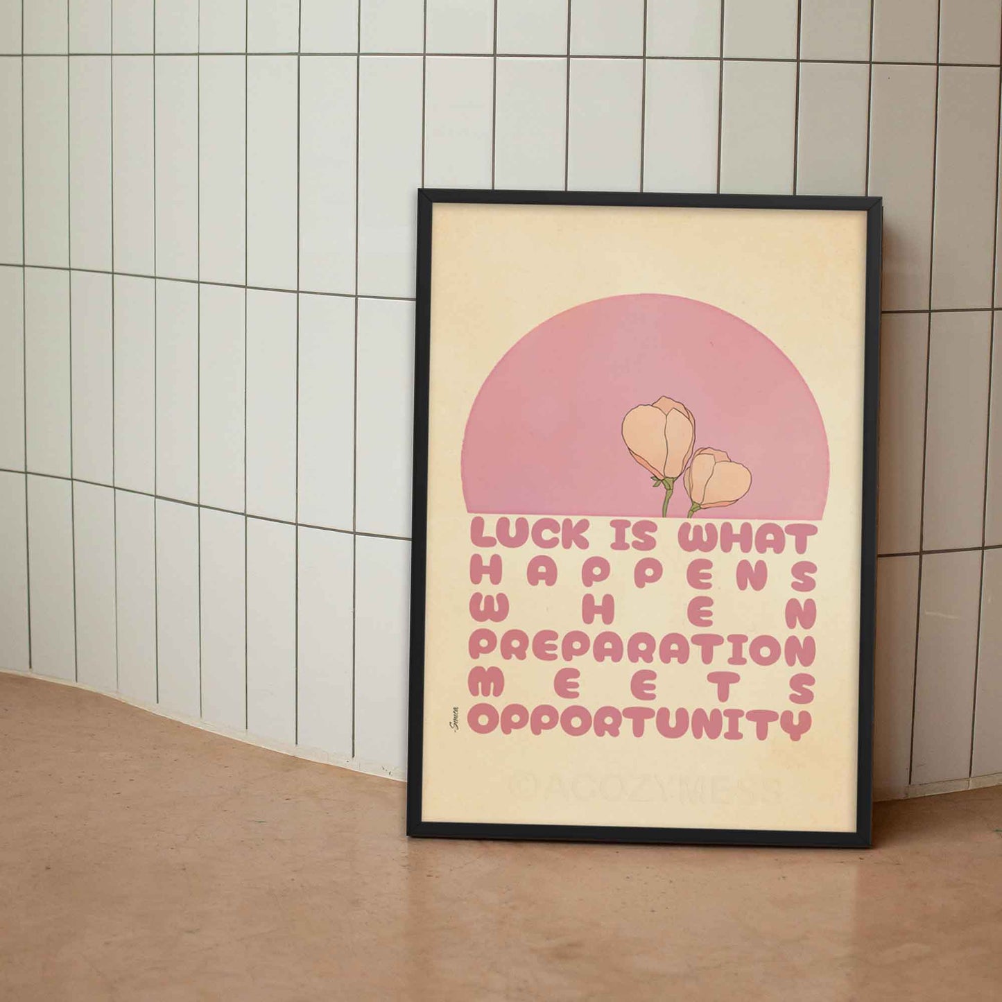 Seneca Poster in pink and beige color in black frame.