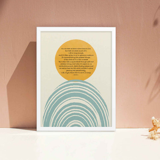 Seneca poster with shortness of life quote with blue and yellow illustration, displayed in white frame