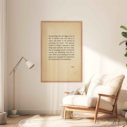 A vintage-style poster featuring a powerful Stoic quote by Seneca in black typography on an aged, old-paper background in oakwood frame on a calming corner wall.