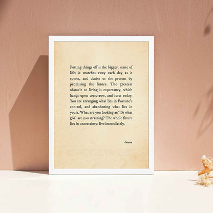 A vintage-style poster featuring a powerful Stoic quote by Seneca in black typography on an aged, old-paper background in white frame.