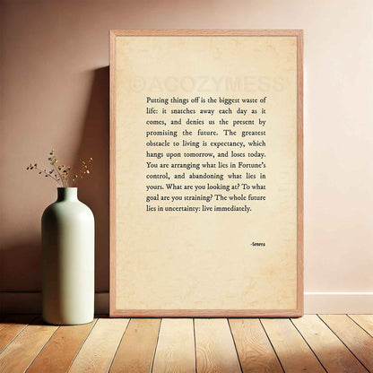 A vintage-style poster featuring a powerful Stoic quote by Seneca in black typography on an aged, old-paper background in oakwood frame.