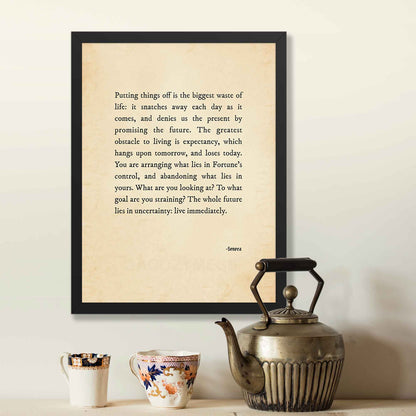 A vintage-style poster featuring a powerful Stoic quote by Seneca in black typography on an aged, old-paper background in black frame, as a spiritual mindfulness decor.