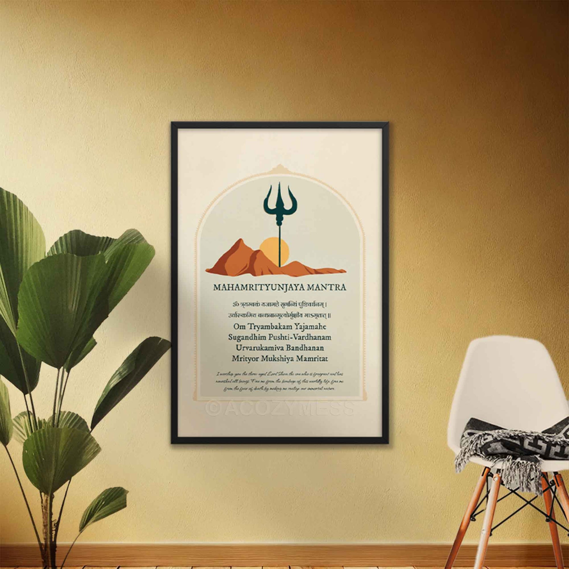 Art print featuring the Mahamrityunjaya Mantra in Sanskrit and English with its meaning, alongside an illustration of mountains, the sun, and a trishul, symbolizing the deity Shiva, in black frame.