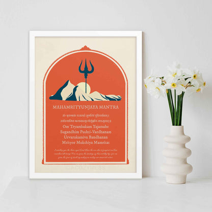 MahaMritunjaya mantra poster with mountain and trishul illustration symbolizing shiva in red, biege and blue, in white frame.