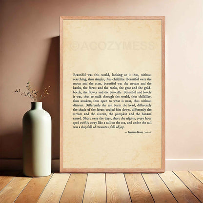 A vintage-style poster featuring a quote from Hermann Hesse’s Siddhartha in black typography on an old paper-textured background. The design evokes a sense of nostalgia, mindfulness, and childlike wonder, encouraging appreciation for the beauty of the natural world, in an oakwood frame.
