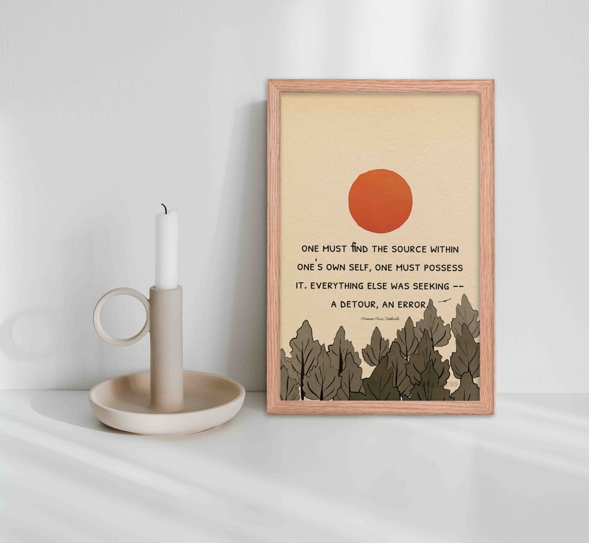 Art print featuring the quote 'One must find the source within one's own Self, one must possess it. Everything else was seeking -- a detour, an error' by Hermann Hesse from 'Siddhartha,' accompanied by a scenic nature illustration in oakwood frame.