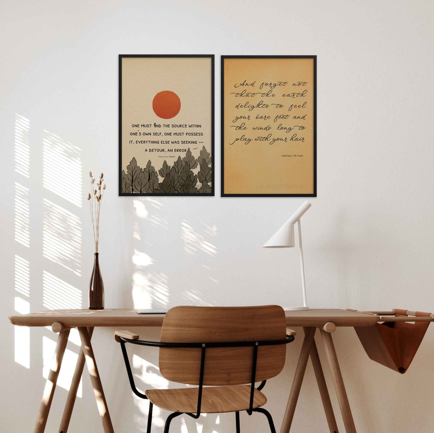 Siddhartha on self journey wall art poster in black frame and kahlil gibran on embracing nature quote art ppster in black frame.