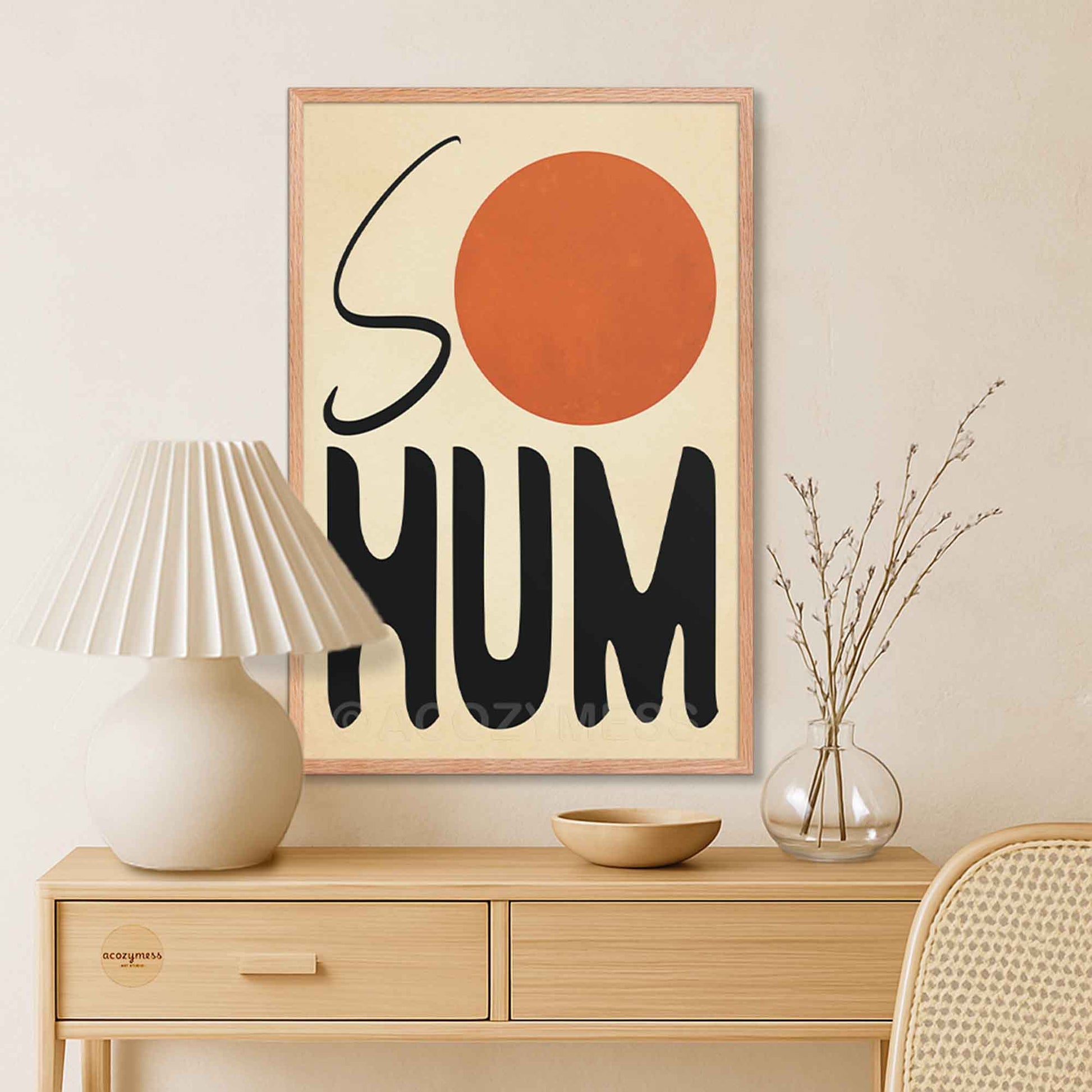 So Hum mantra print in an oakwood frame with sun art on beige background, adding a natural, calming touch to your space.
