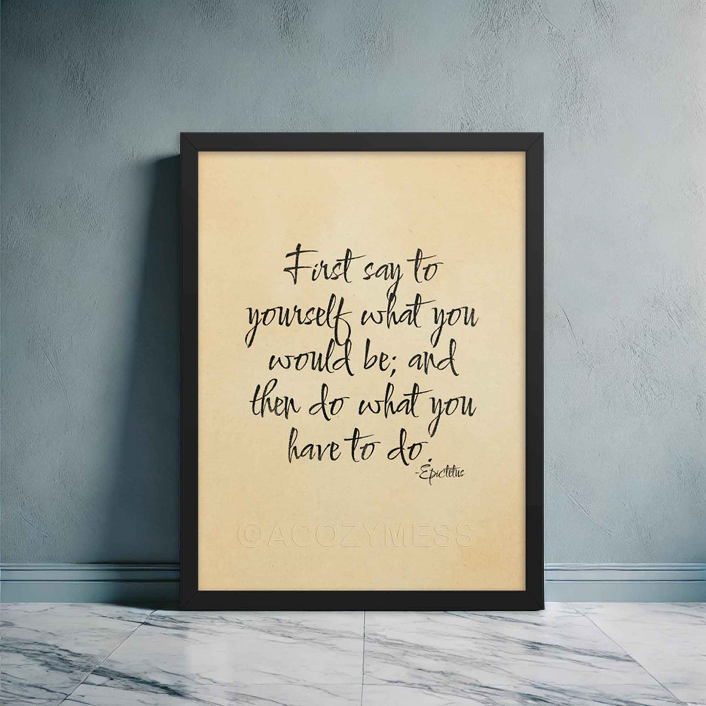 First say to yourself what you would be and then do what you have to do, a quote By Epictetus, black on beige, displayed in black frame poster.