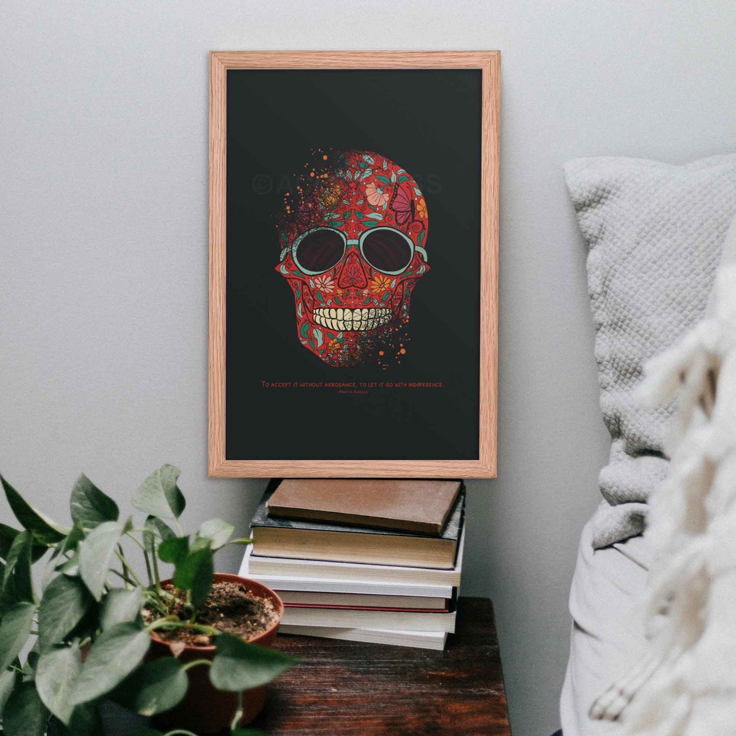 Marcus Aurelius quote on success and failure featured in stoic wall art with a skull and floral design on black background color in oakwood frame, study decor