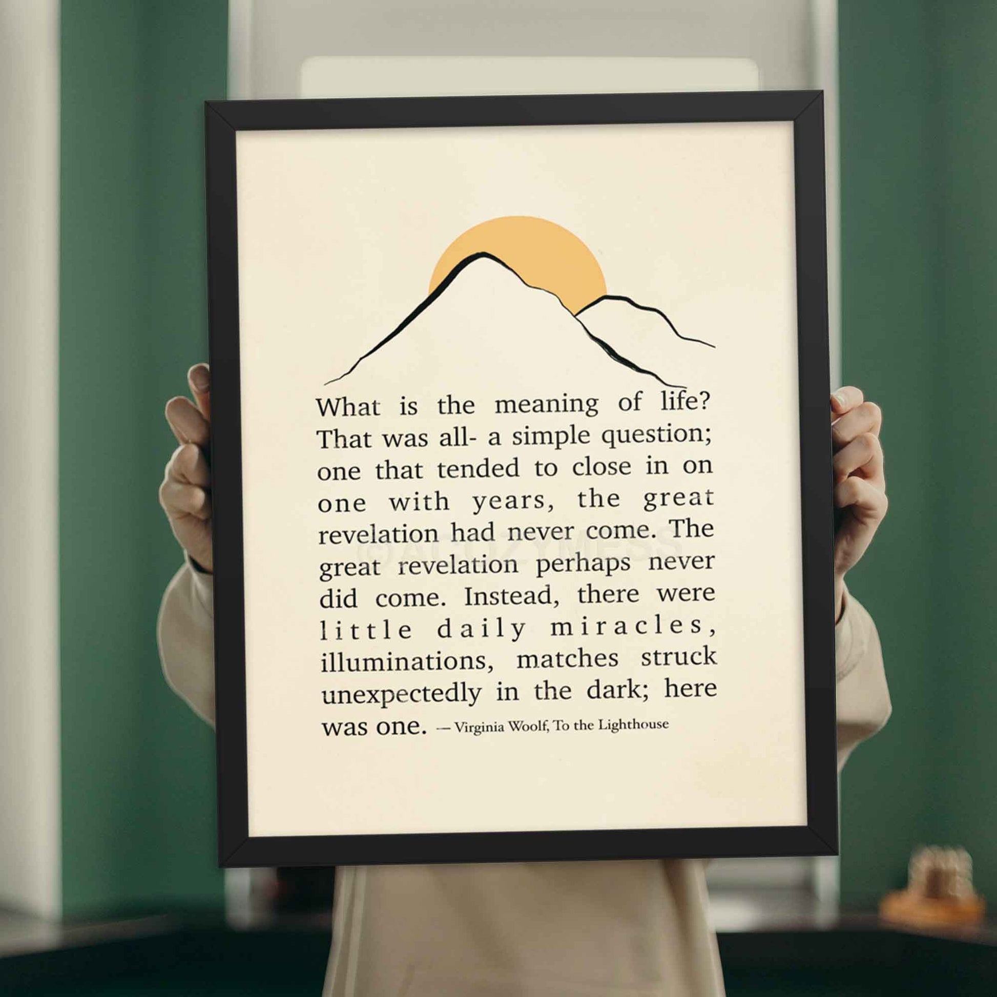 Virginia Woolf quote poster from To the Lighthouse, featuring minimalist mountain and sun illustration, displayed in a black frame.