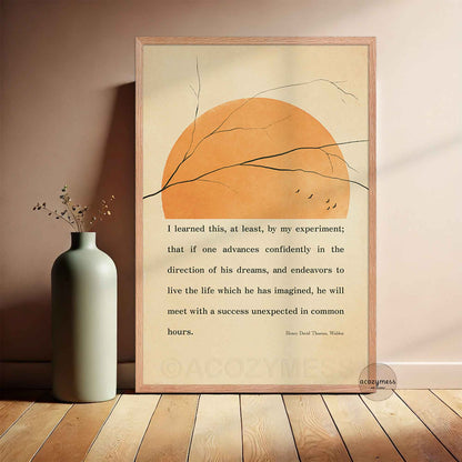Henry David Thoreau quote wall art in oakwood frame with beige sun, tree branches and birds design