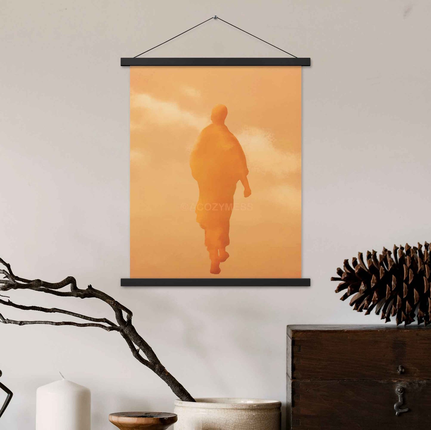 Art print of a walking monk in warm orange and yellow hues, capturing serenity and spiritual presence.