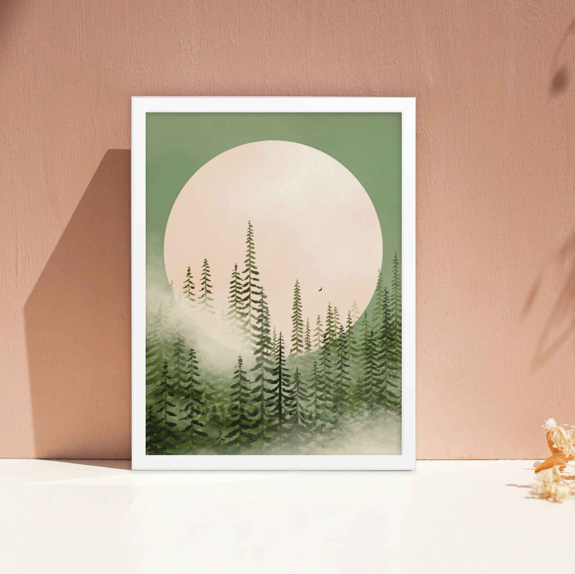 Illustration of a misty pine tree forest in shades of emerald green with a majestic moon in the background, evoking tranquility and natural beauty, framed in white.