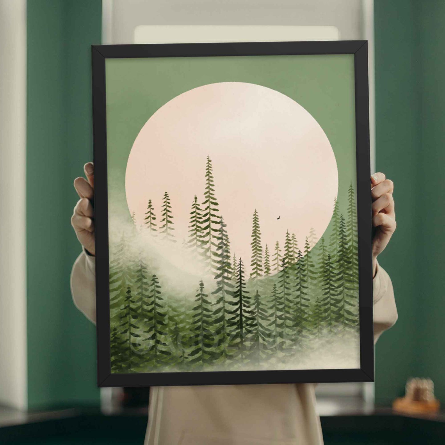 Illustration of a misty pine tree forest in shades of emerald green with a majestic moon in the background, evoking tranquility and natural beauty, displayed in black frame.