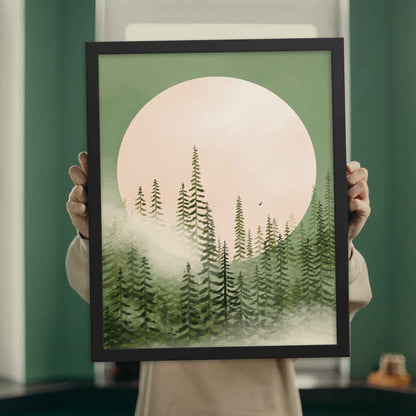 Illustration of a misty pine tree forest in shades of emerald green with a majestic moon in the background, evoking tranquility and natural beauty, displayed in black frame.