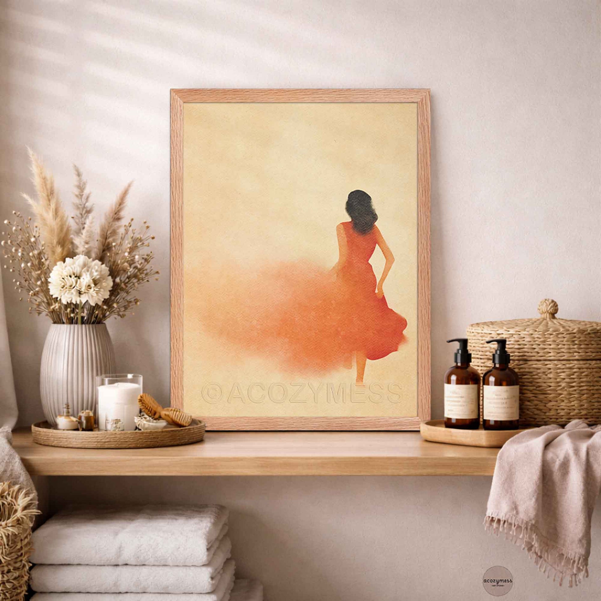 Oakwood Framed artwork of a woman in an orange dress on a wooden shelf 