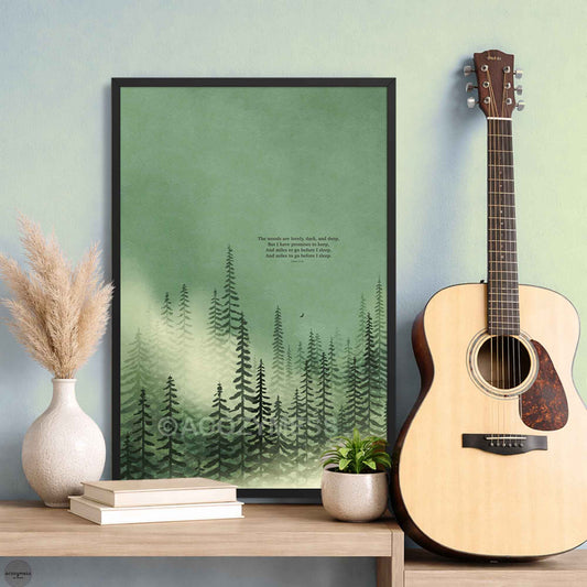 Black framed Robert Frost poem print “Stopping by Woods on a Snowy Evening,” featuring a calming misty pine forest art in green.