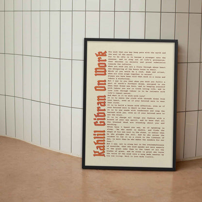 On Work motivational poster by Kahlil Gibran in black frame.