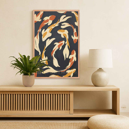 Beige, yellow, and orange fish wall art on dark blue background displayed in an oakwood frame with a warm, natural finish.