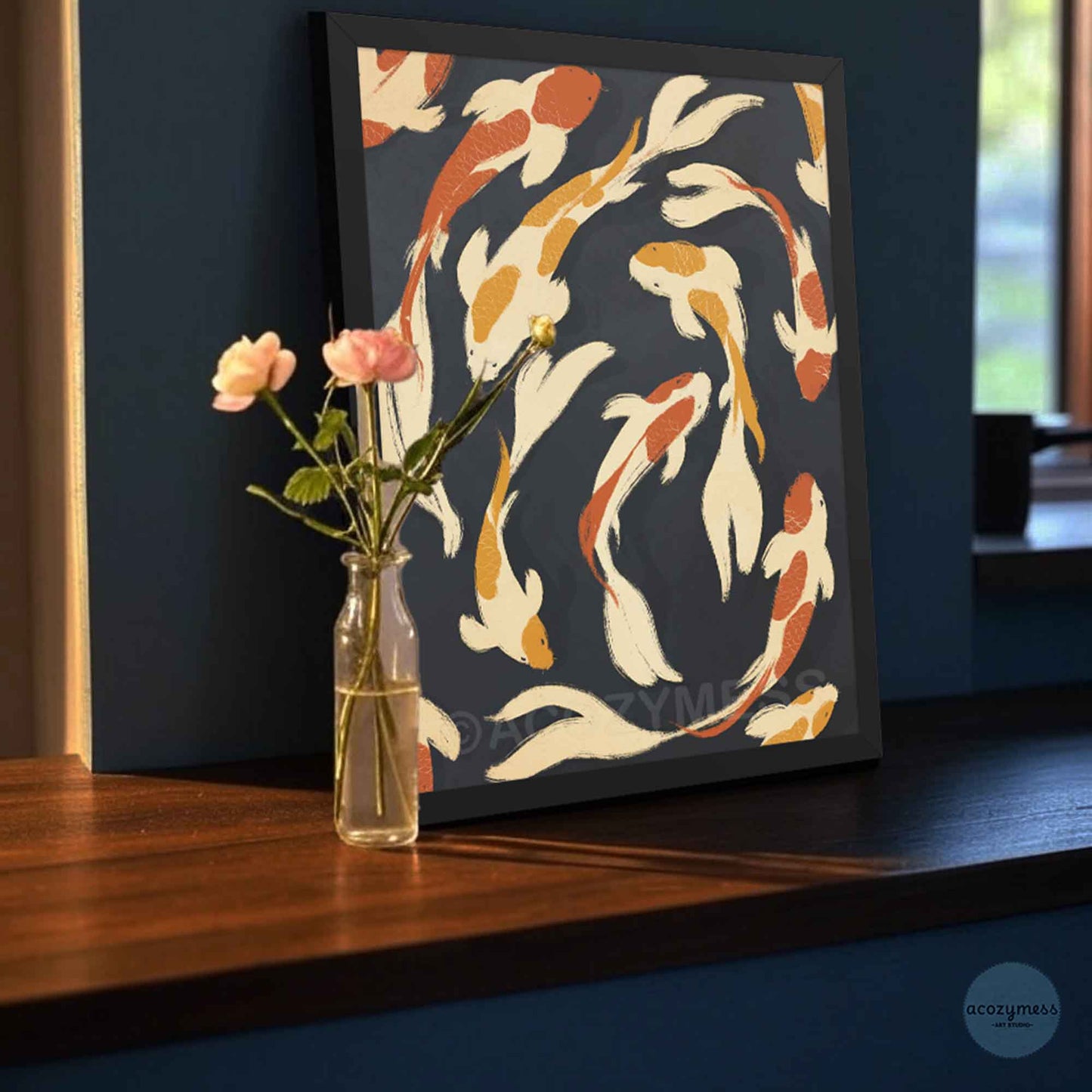 Abstract fish wall art in beige, yellow, and orange on dark blue background shown in a sleek black frame for a bold, modern look.