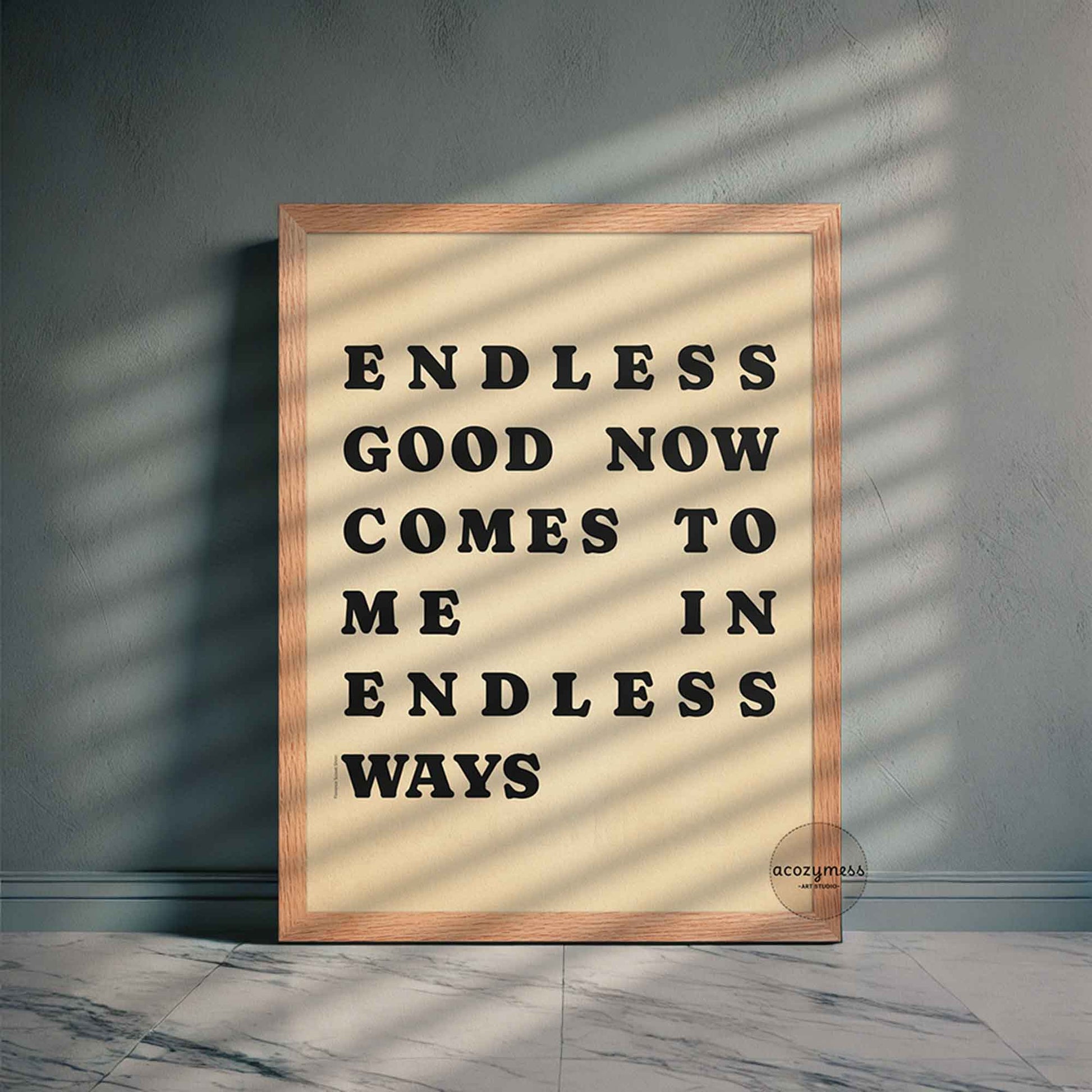 Framed poster with motivational quote on a wall